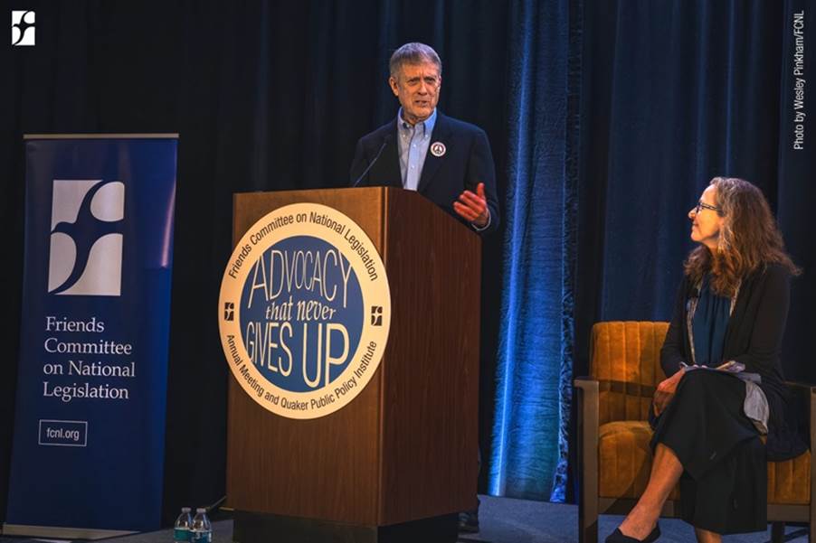 A person standing at a podium

AI-generated content may be incorrect.