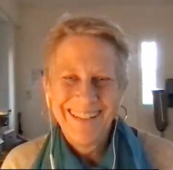 A person smiling for the camera

Description automatically generated with medium confidence